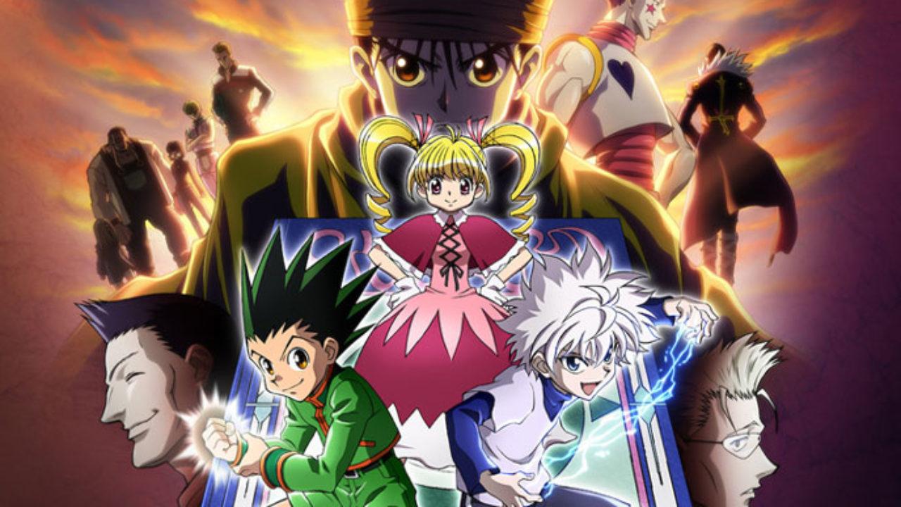 Gon and Killua are next to each other while their teacher is behind them and Gon's dad is taking up most of the picture.