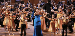 In a harmonious celebration of culture, diplomacy, and music, the world-renowned violinist, Aiman Mussakhajayeva, is set to grace the stages of Carnegie Hall and the United Nations Headquarters during her visit to New York from October 3rd to October 10th, 2023. In a harmonious celebration of culture, diplomacy, and music, the world-renowned violinist, Aiman Mussakhajayeva, is set to grace the stages of Carnegie Hall and the United Nations Headquarters during her visit to New York from October 3rd to October 10th, 2023.