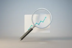 Magnifying glass highlighting an upward growth line on a simple chart against a soft neutral background.
