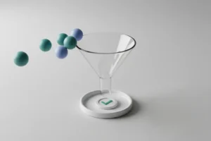 Clear acrylic funnel with teal spheres and a green checkmark token emerging, symbolizing business idea validation on a neutral background.