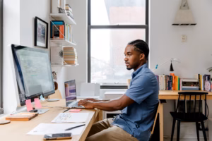 entrepreneur at desk managing MSME business
