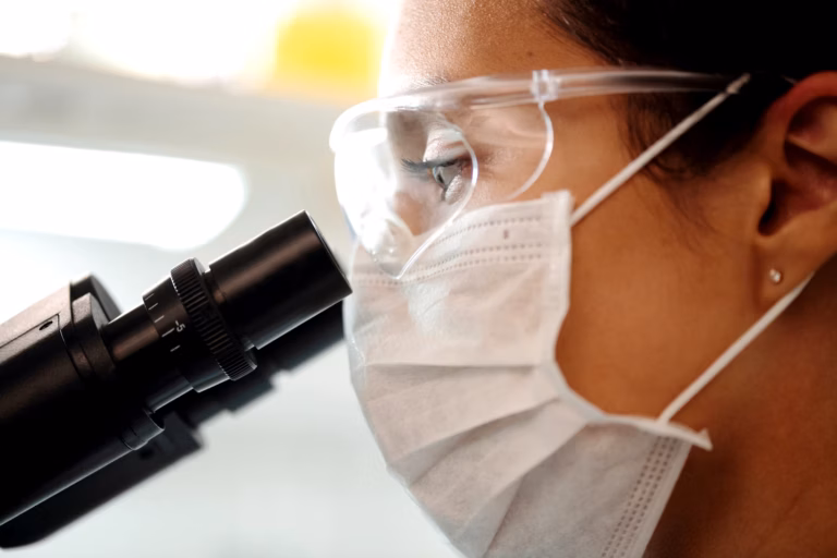 Scientists conducting research in a modern biotech laboratory