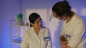 students and researchers working on innovation projects in modern lab setting
