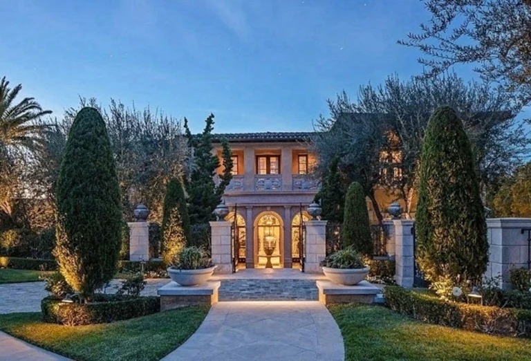 The entrance and landscaped grounds of the home in the Ghomi case