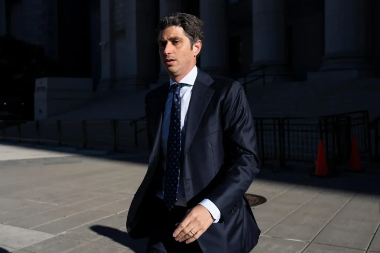 Josh Wander, co-founder of 777 Partners, walks outside a federal courthouse in New York
